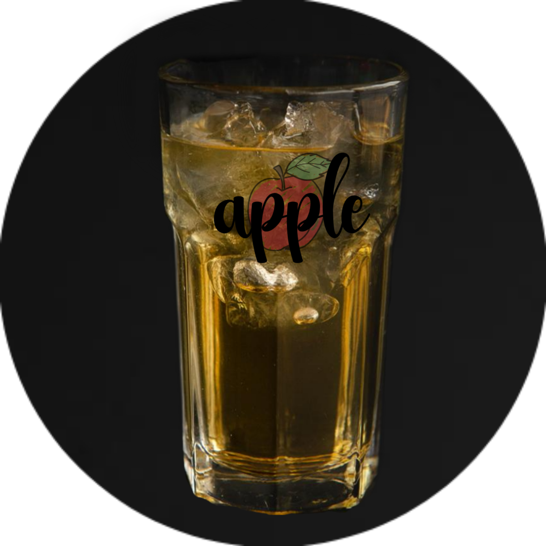 A glass of apple juice with ice in it.